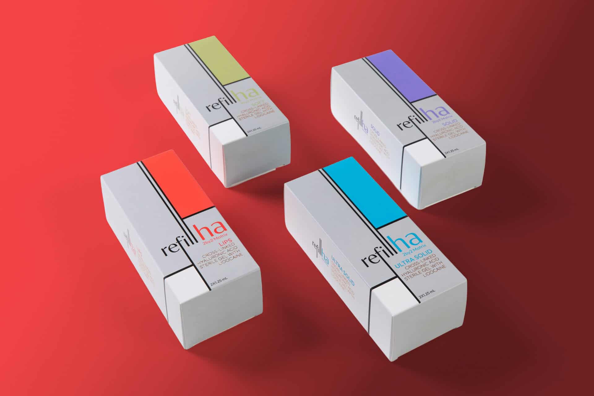 חבילות תדלוק Refill Ha בצבעים שונים על רקע אדום.