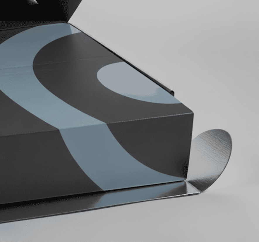 קופסה מעוצבת בצבעי אפור ושחור עם עיצוב מודרני.